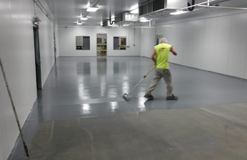 Man painting floor 