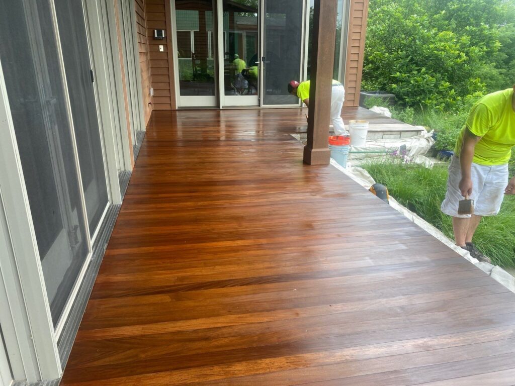 Applying sealer to the Wood Deck in Milwaukee, WI